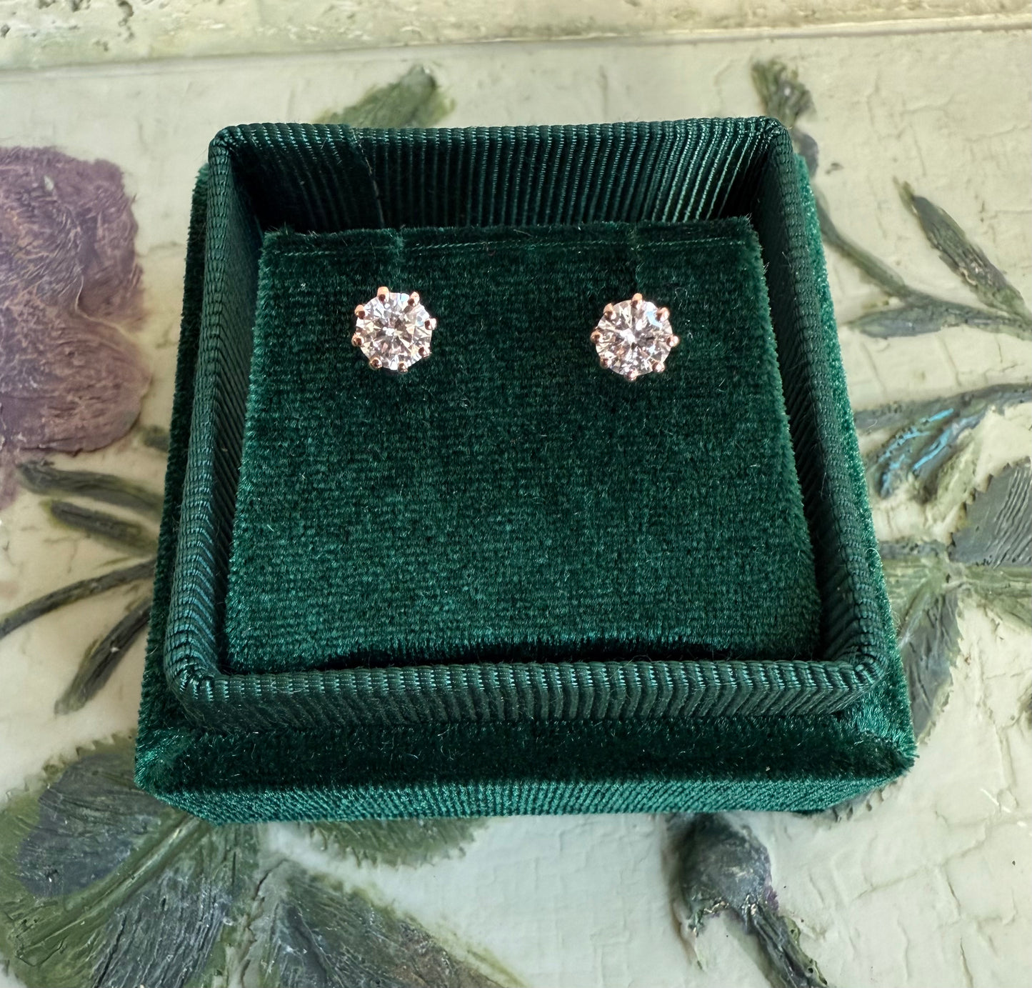 Round brilliant cut lab diamond studs .50 carat weight each totaling 1 Carat are cradled beautifully in an intricate 6 prong setting complementing the sparkling facets of a round diamond. This item is a must have staple. 14K white gold 14K rose gold 14K yellow gold. screw backs