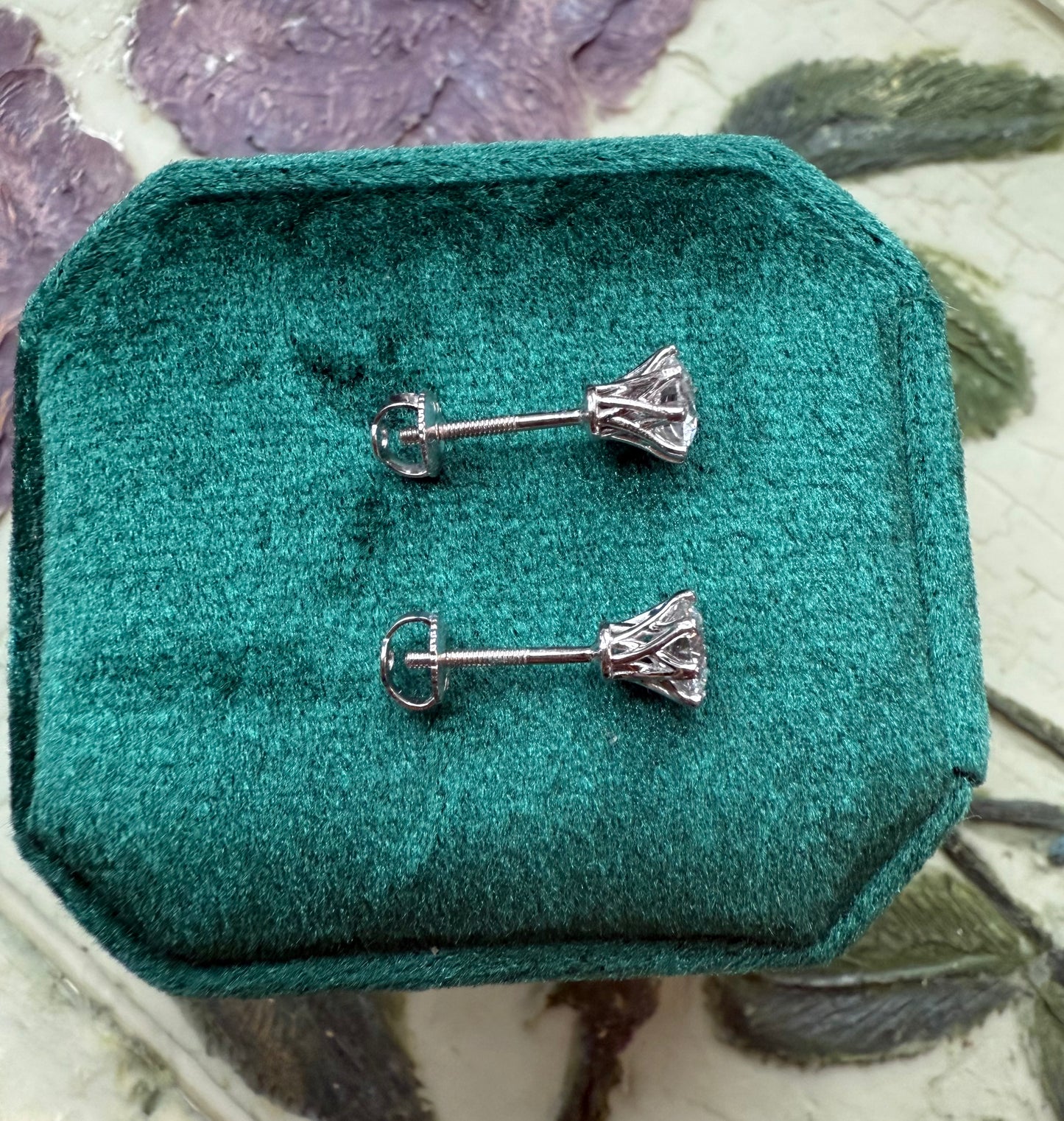 Round brilliant cut lab diamond studs .50 carat weight each totaling 1 Carat are cradled beautifully in an intricate 6 prong setting complementing the sparkling facets of a round diamond. This item is a must have staple. 14K white gold 14K rose gold 14K yellow gold. screw backs