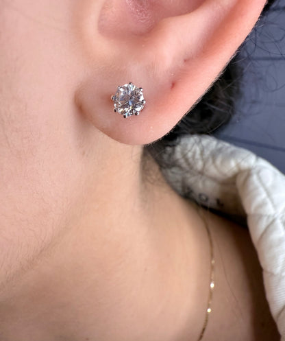 Round brilliant cut lab diamond studs .50 carat weight each totaling 1 Carat are cradled beautifully in an intricate 6 prong setting complementing the sparkling facets of a round diamond. This item is a must have staple. 14K white gold 14K rose gold 14K yellow gold. screw backs 
