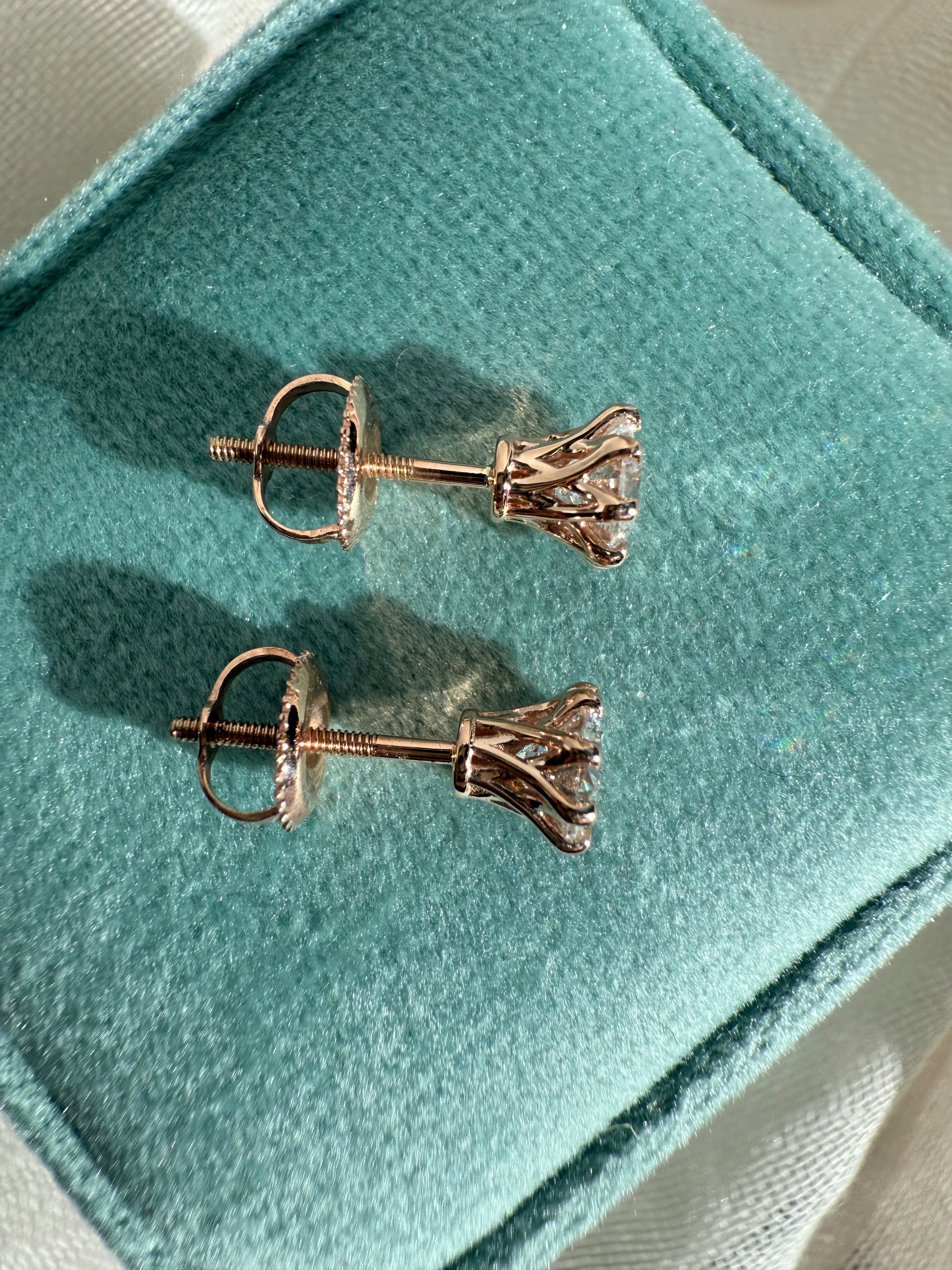 Round brilliant cut lab diamond studs .50 carat weight each totaling 1 Carat are cradled beautifully in an intricate 6 prong setting complementing the sparkling facets of a round diamond. This item is a must have staple. 14K white gold 14K rose gold 14K yellow gold. screw backs 