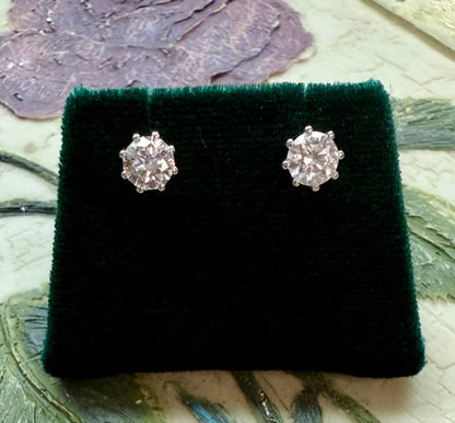 Round brilliant cut lab diamond studs .50 carat weight each totaling 1 Carat are cradled beautifully in an intricate 6 prong setting complementing the sparkling facets of a round diamond. This item is a must have staple. 14K white gold 14K rose gold 14K yellow gold. screw backs 