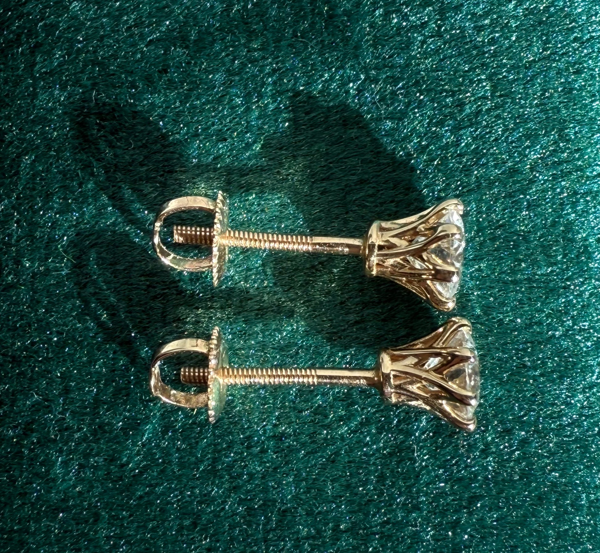 Round brilliant cut lab diamond studs .50 carat weight each totaling 1 Carat are cradled beautifully in an intricate 6 prong setting complementing the sparkling facets of a round diamond. This item is a must have staple. 14K white gold 14K rose gold 14K yellow gold. screw backs 