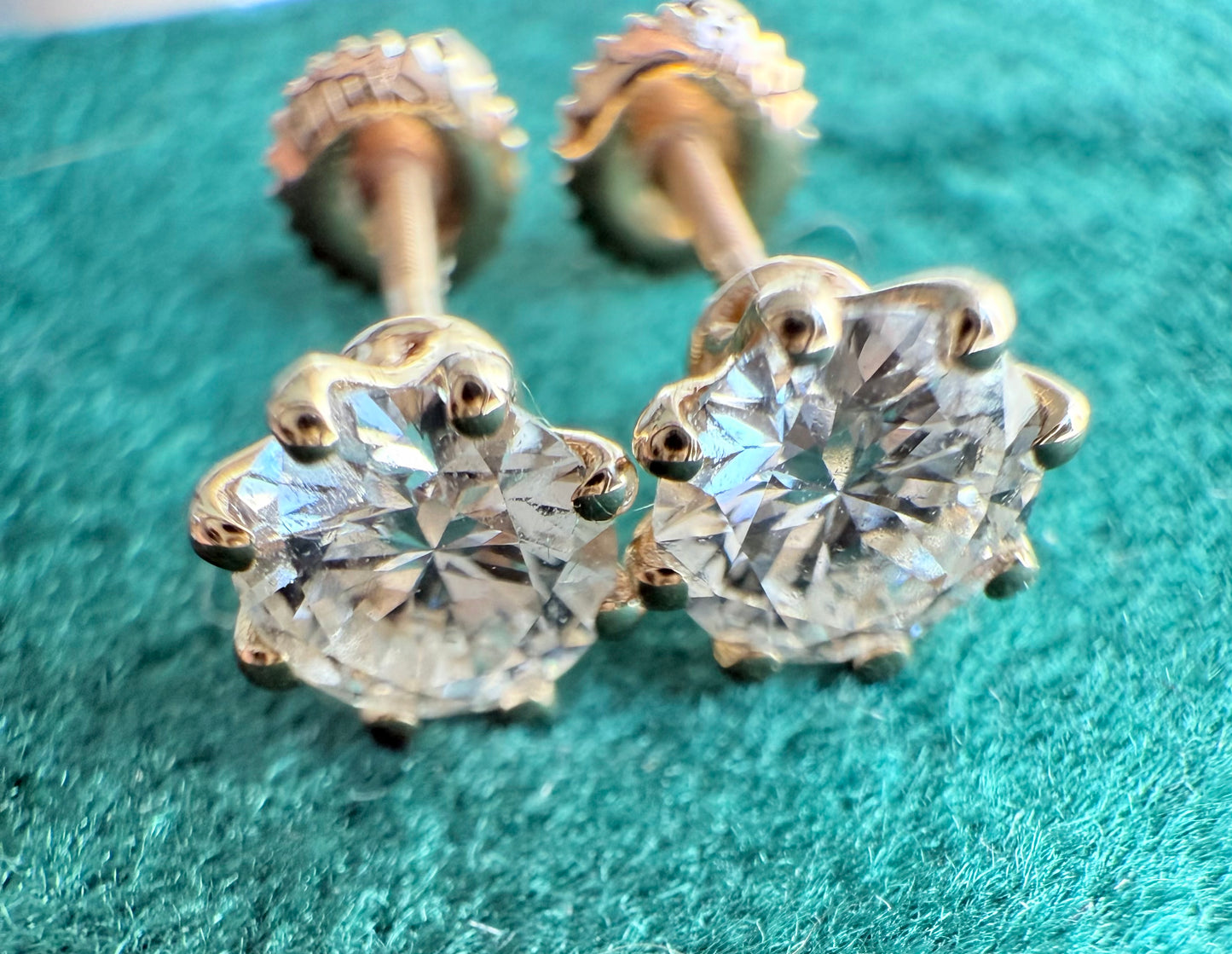 Round brilliant cut lab diamond studs .50 carat weight each totaling 1 Carat are cradled beautifully in an intricate 6 prong setting complementing the sparkling facets of a round diamond. This item is a must have staple. 14K white gold 14K rose gold 14K yellow gold. screw backs 