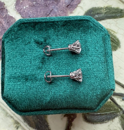 Round brilliant cut lab diamond studs .50 carat weight each totaling 1 Carat are cradled beautifully in an intricate 6 prong setting complementing the sparkling facets of a round diamond. This item is a must have staple. 14K white gold 14K rose gold 14K yellow gold. screw backs 