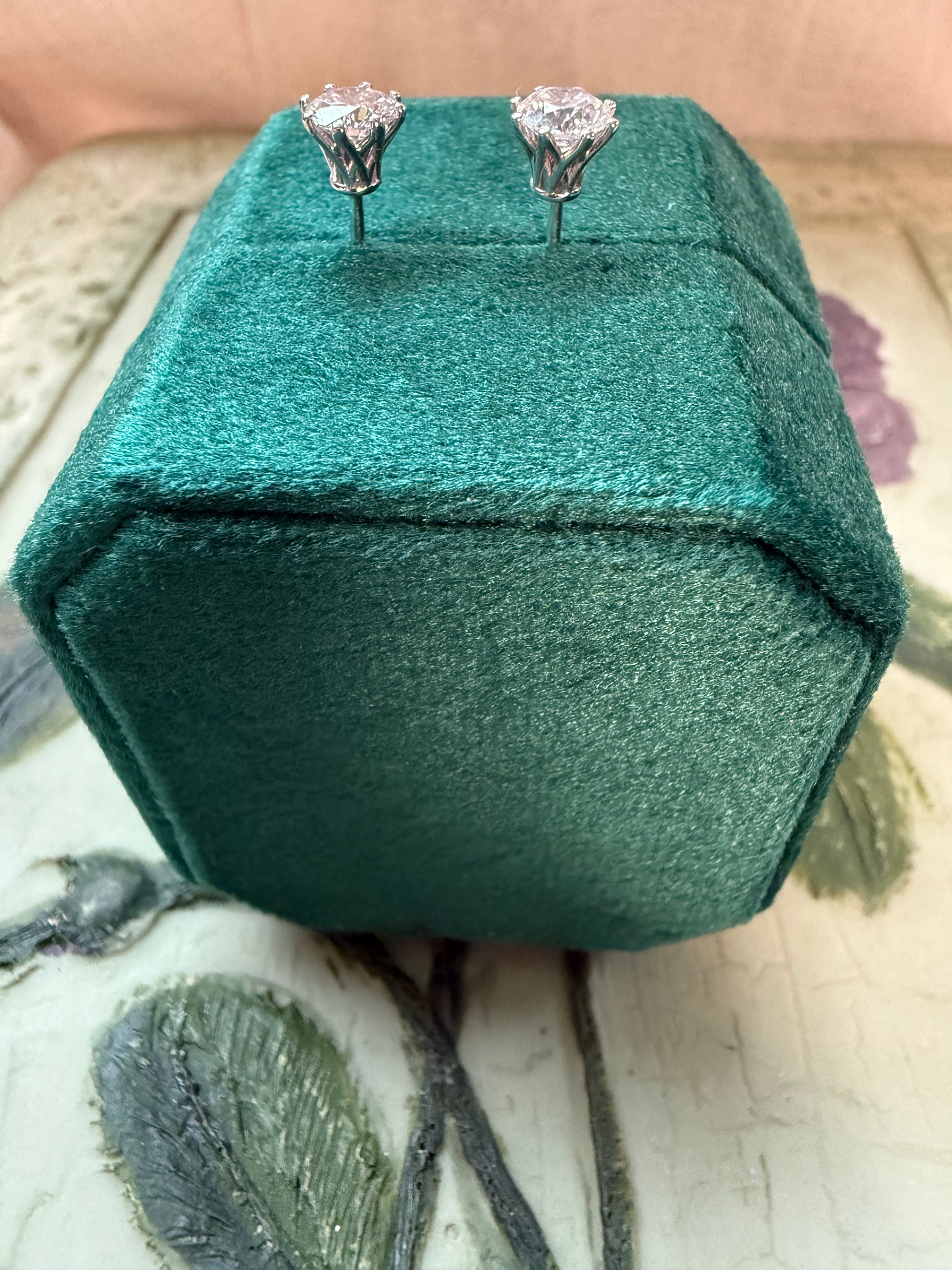 Round brilliant cut lab diamond studs .50 carat weight each totaling 1 Carat are cradled beautifully in an intricate 6 prong setting complementing the sparkling facets of a round diamond. This item is a must have staple. 14K white gold 14K rose gold 14K yellow gold. screw backs 