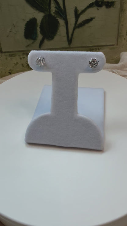 Round brilliant cut lab diamond studs .50 carat weight each totaling 1 Carat are cradled beautifully in an intricate 6 prong setting complementing the sparkling facets of a round diamond. This item is a must have staple. 14K white gold 14K rose gold 14K yellow gold. screw backs 