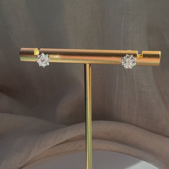 Round brilliant cut lab diamond studs .50 carat weight each totaling 1 Carat are cradled beautifully in an intricate 6 prong setting complementing the sparkling facets of a round diamond. This item is a must have staple. 14K white gold 14K rose gold 14K yellow gold. screw backs 